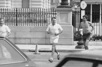 <p>Pres. Jimmy Carters National Security Adviser Zbigniew Brzezinski, left, and his aide Jerrold Schecter share a morning jog just outside the White House, Monday, Aug. 6, 1979, Washington, D.C. The two braved Washingtons heat and humidity for their run. (Photo: Ira Schwarz/AP) </p>