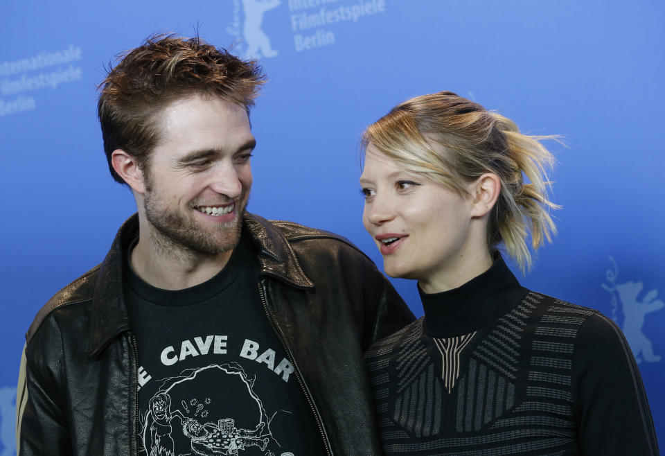 Actors Robert Pattinson and Mia Wasikowska pose during a photocall to promote the movie Damsel at the 68th Berlinale International Film Festival in Berlin, Germany, February 16, 2018. REUTERS/Axel Schmidt