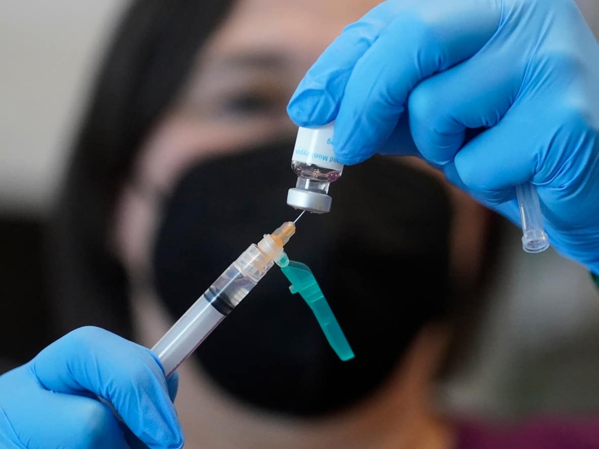 New Brunswick is getting more doses of the monkeypox vaccine from the federal government, said Dr. Yves Léger, the acting deputy chief medical officer of health. (Rick Bowmer/The Associated Press - image credit)