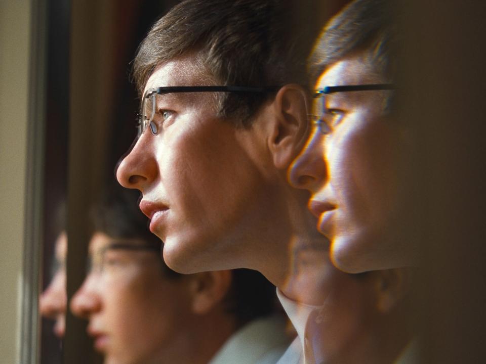 A closeup of Oliver wearing eyeglasses in a scene from "Saltburn"