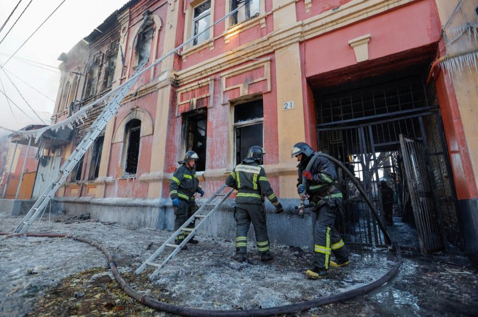 Firefighters work outside an office building heavily damaged in shelling in the course of Russia-Ukraine conflict in Donetsk on Monday (REUTERS)