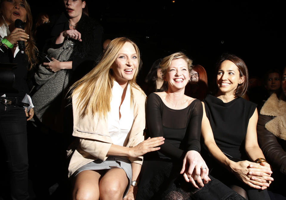 Actresses Uma Thurman and Gretchen Mol attend the Donna Karan Autumn/Winter 2013 collection during New York Fashion Week