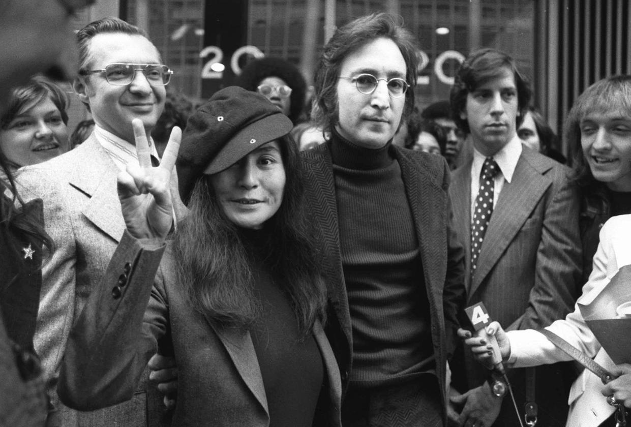 Yoko Ono and John Lennon leave immigration court in New York City in 1972.