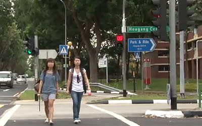 One student living in Hougang asked whether he could pay less tax since the area does not enjoy as much upgrading programmes. (Yahoo! Photo).