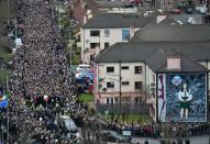 The funeral procession for former Northern Ireland Deputy First Minister Martin McGuinness makes it way to St Columba's Church Long Tower in Derry, Northern Ireland on March 23, 2017