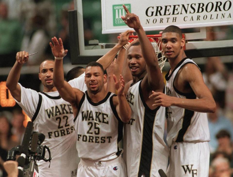 (Left to Right) Randolph Childress, Jerry Braswell, Travis Banks, Tim Duncan calling for coach Dave Odom to help cut down the first net after the Demon Deacons won the 1995 ACC Tournament.