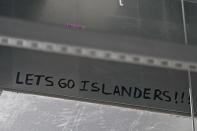 A message is displayed on the duct work as construction continues at UBS Arena, the future home of the New York Islanders NHL hockey team, in Elmont, N.Y., Thursday, June 3, 2021. The building will have all the bells and whistles and be better accessible to Islanders fans than the recent temporary home in Brooklyn, and the hope is it will provide a strong home-ice advantage for decades to come. (AP Photo/Seth Wenig)