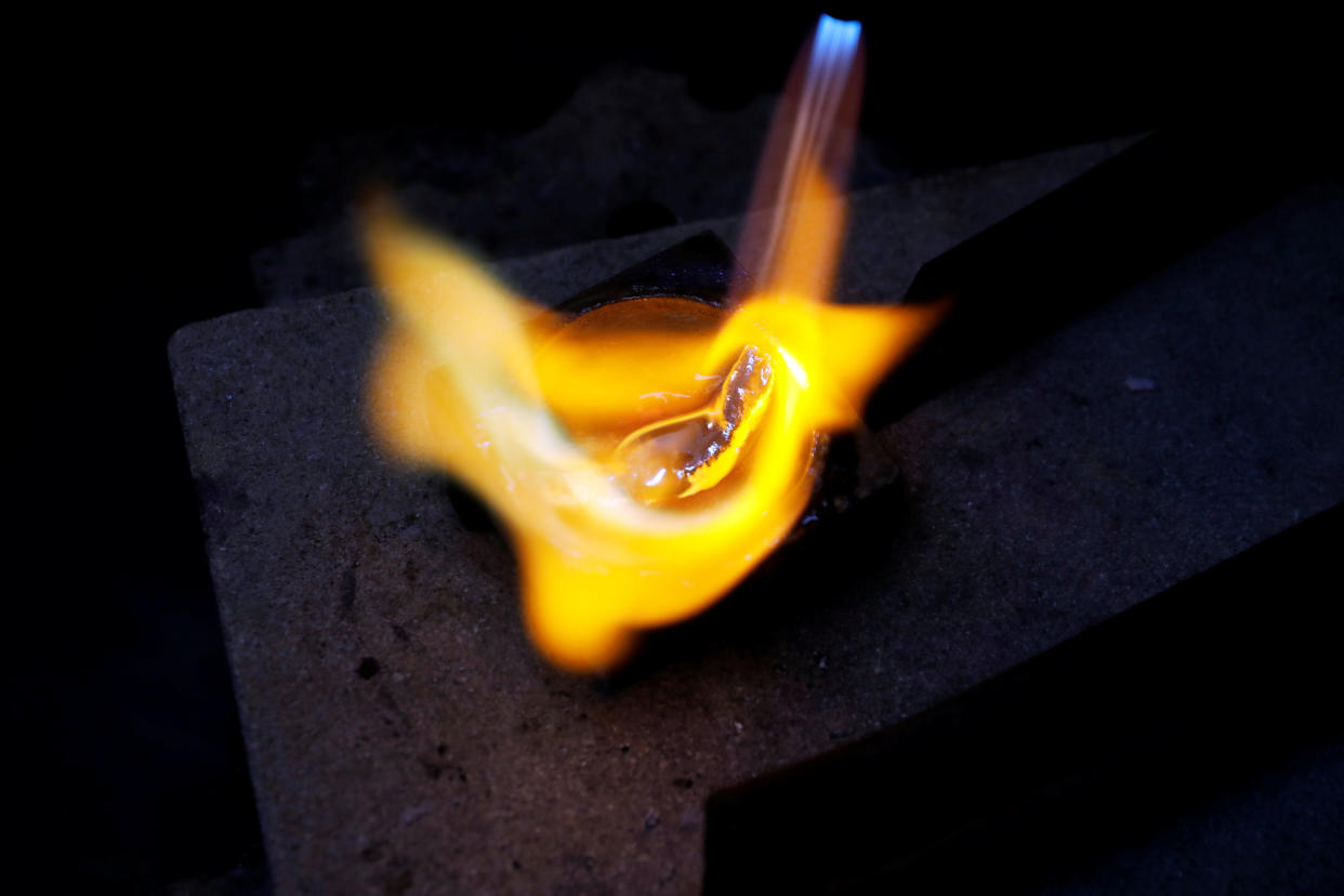 A blowtorch in use. (PHOTO: REUTERS/Ronen Zvulun)