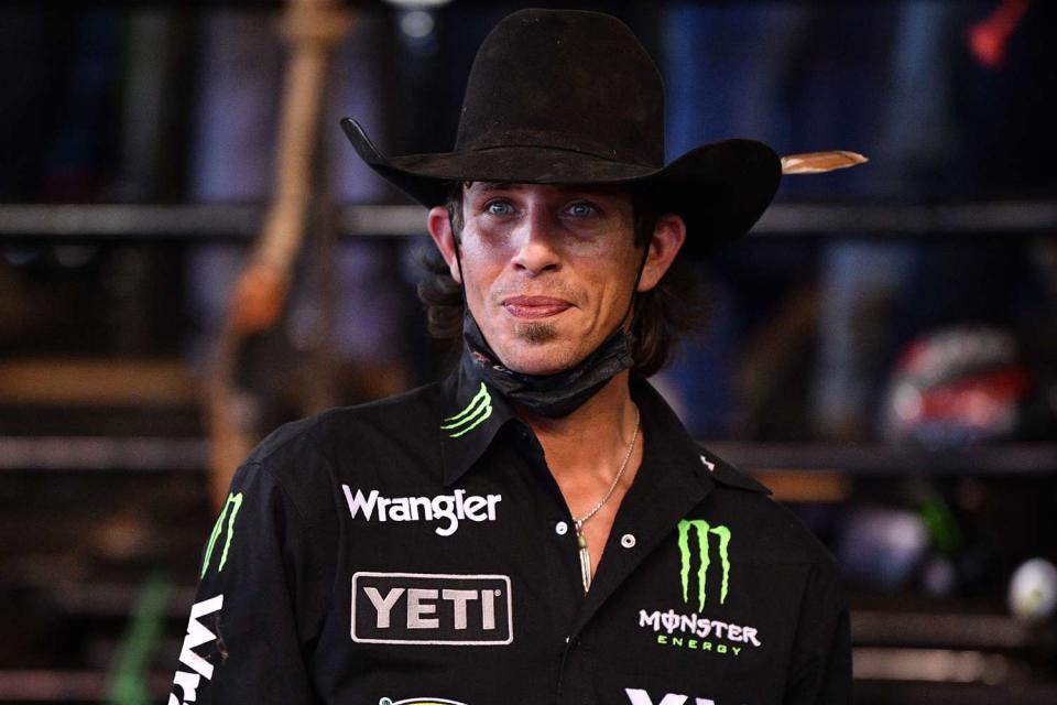 <p>Mark Brown/Getty </p> JB Mauney looks on during the PBR Unleash The Beast bull riding event at Okeechobee Agri-Civic Center 