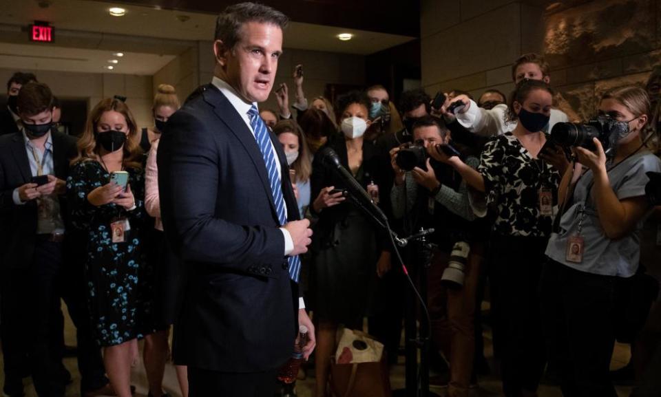 Adam Kinzinger delivers remarks to the media in May