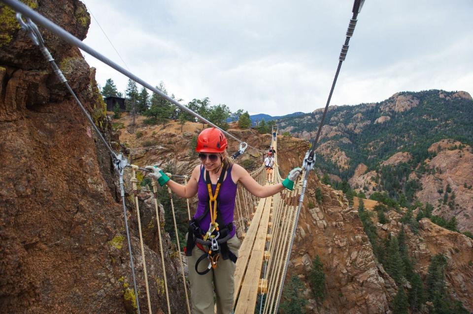 Teens and families can soar on ziplines and traverse rope bridges over canyons with The Broadmoor's Soaring Adventures.