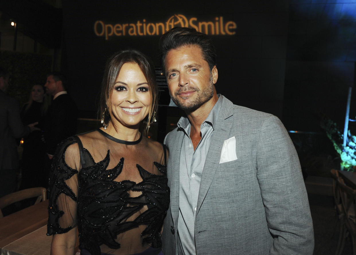 Brooke Burke-Charvet and David Charvet, seen here at the Operation Smile’s Annual Smile Gala in September, are divorcing. (Photo: Amy Graves/Wireimage)