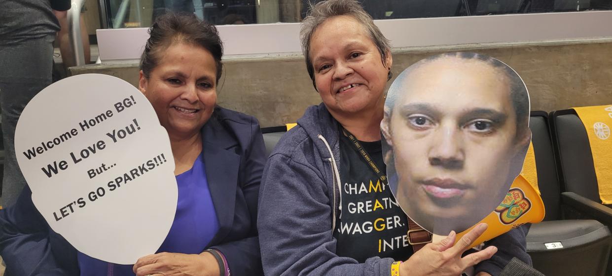 Sonia Campos and Darlene Granillo were among the two dozen Sparks season ticket holders with special signs celebrating Brittney Griner’s first game after her wrongful detention, but rooting for Los Angeles at home. (Cassandra Negley/Yahoo Sports)