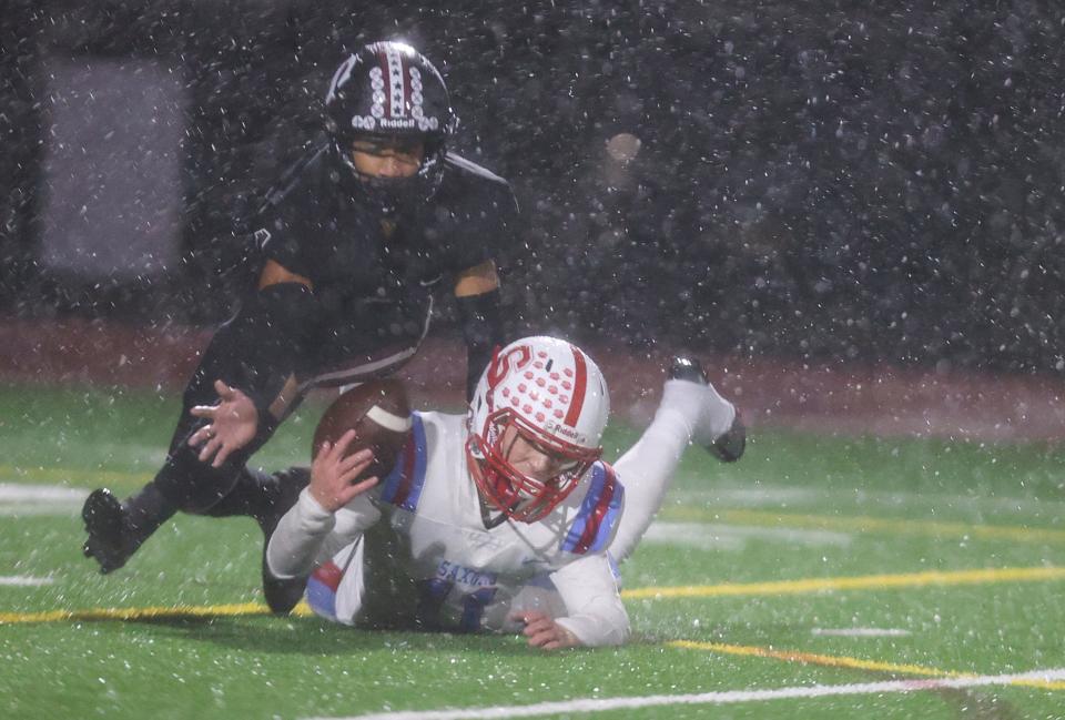 South Salem's Parker Williams (11) misses a pass during the first quarter of the 6A state playoff game against Sherwood at Sherwood High School in Sherwood, Ore. on Friday, Nov. 4, 2022.