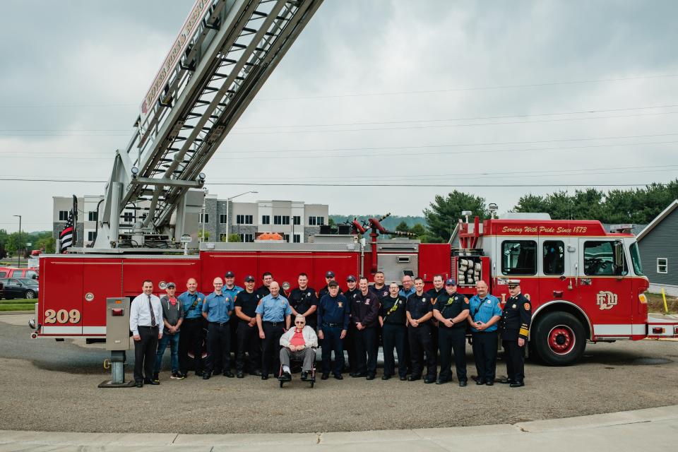 Firefighters in attendance for the celebration of the Dover Fire Department's 150th year of operation pose for a group picture, Sunday, May 21 at the north station. Pictured at far left is Mayor Shane Gunnoe, and at far right, Chief Russ Volkert. Seated in the wheelchair is the oldest surviving retired Dover firefighter, Tom Dean, 92. Standing to the right of Tom is Tom Swinderman whom retired in 1991. At Tom's left is Captain Brooks Ross.