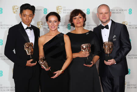 Kazuhiro Tsuji, Lucy Sibbick, Ivana Primorac and David Malinowski holds their awards for Make Up and Hair for the film Darkest Hour at the British Academy of Film and Television Awards (BAFTA) at the Royal Albert Hall in London, Britain, February 18, 2018. REUTERS/Hannah McKay