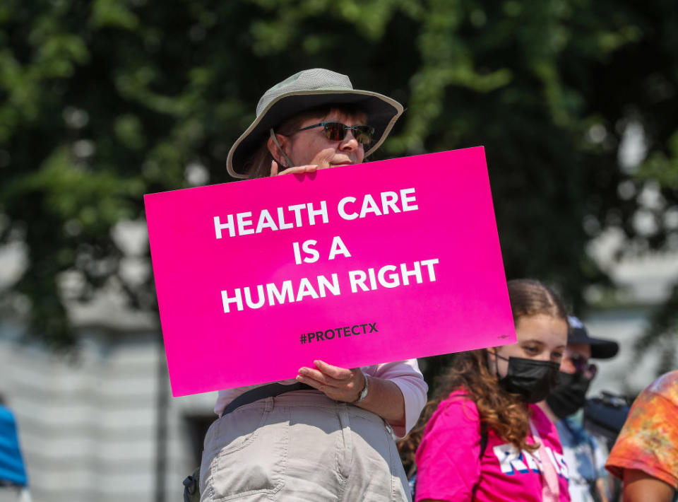 A protest sign that says "healthcare is a human right"