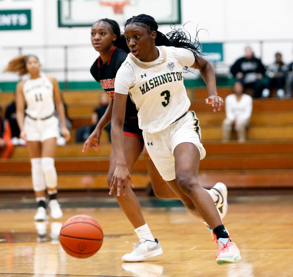 South Bend Washington junior Ryiah Wilson dribbles the ball up the court during a girls basketball game against Bolingbrook Saturday, Jan. 6, 2024, at Washington High School.