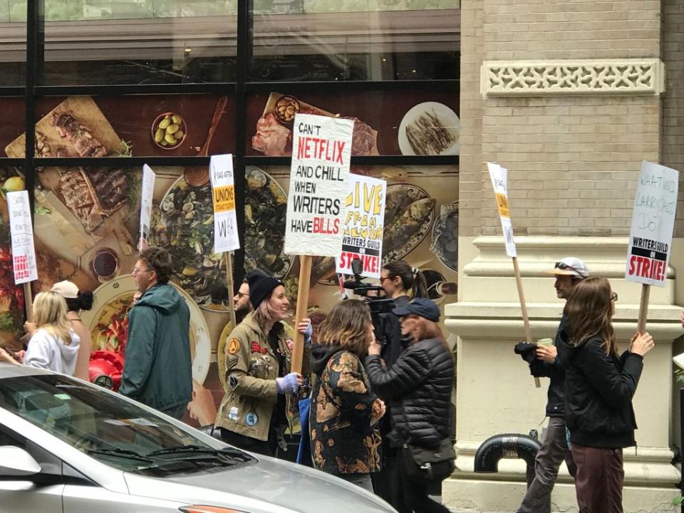 Several hundred WGA pickets target Netflix’s New York offices near Union Square