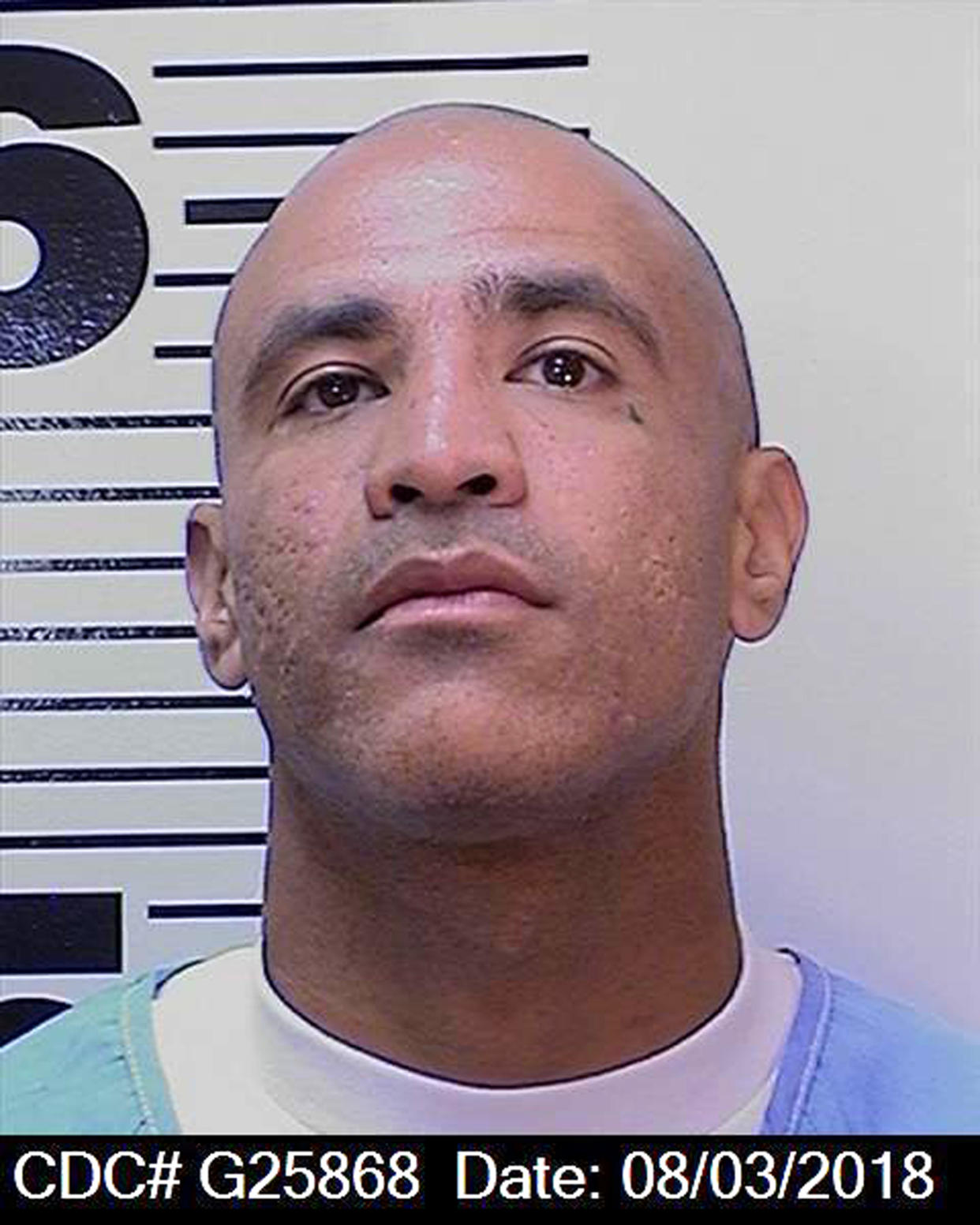 This Aug. 3, 2018 photo provided by the California Department of Corrections and Rehabilitation (CDCR) shows death row inmate Luis Rodriguez, 34. Corrections spokeswoman Terry Thornton says Rodriguez is the suspect in the stabbing death of fellow condemned inmate Jonathan Fajardo, 30, who was stabbed to death in the chest and neck with an inmate-made weapon Friday, Oct. 5, 2018, in a recreational yard of the cell house that holds the bulk of condemned inmates at San Quentin State Prison. (California Department of Corrections and Rehabilitation via AP)