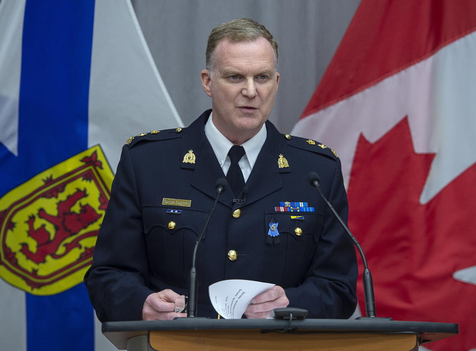 Royal Canadian Mounted Police Supt. Darren Campbell provides an update of the Nova Scotia shootings at RCMP headquarters in Dartmouth, Nova Scotia, Tuesday, April 28, 2020. Police say a gunman who killed 22 people in Nova Scotia this month obtained a replica police car at auction last fall. RCMP Supt. Campbell said Gabriel Wortman outfitted his vehicle with a light bar and decals that made it look almost identical to a genuine RCMP vehicle. (Andrew Vaughan/The Canadian Press via AP)