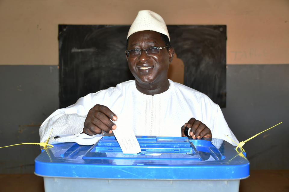 FILE- In this Sunday, Aug. 12, 2018, file photo released by the Union for the Republic and Democracy party, showing Soumaila Cisse, opposition presidential candidate casting his ballot during the Presidential second round election in Niafunke, Mali. Mali's opposition leader said Friday, Aug 17, 2018, he rejected results that proclaimed incumbent President Ibrahim Boubacar Keita the winner of a runoff presidential election.(Boubacar Sada Sissoko/Union for the Republic and Democracy via AP, File)