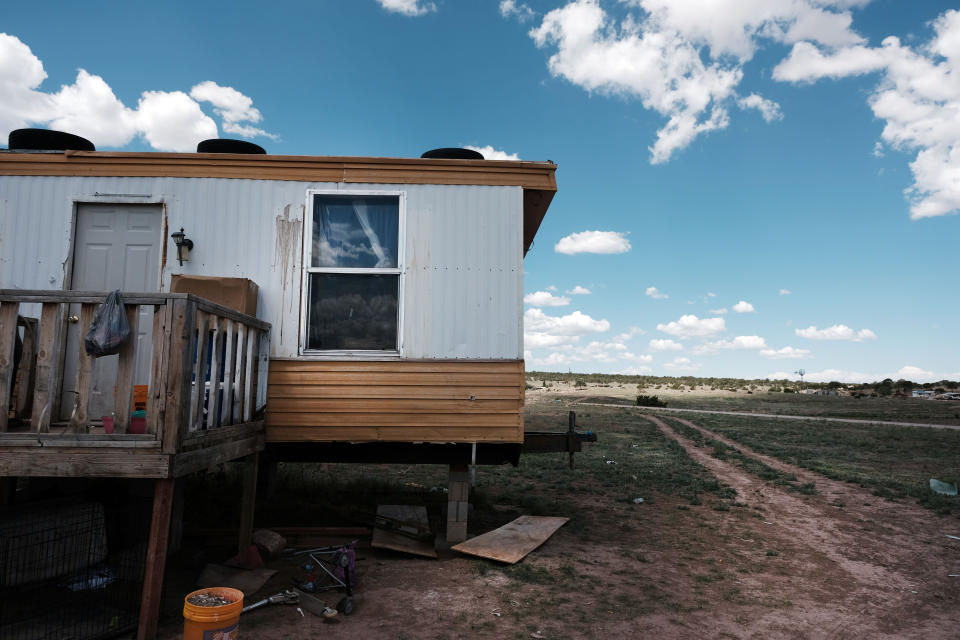 A trailer stands on land belonging to members of the Navajo Nation in Thoreau, New Mexico on June 06, 2019. Due to a legacy of poverty, marginalization and disputed water rights, up to 40 percent of Navajo Nation households don&rsquo;t have clean running water at home. (Photo: Spencer Platt via Getty Images)