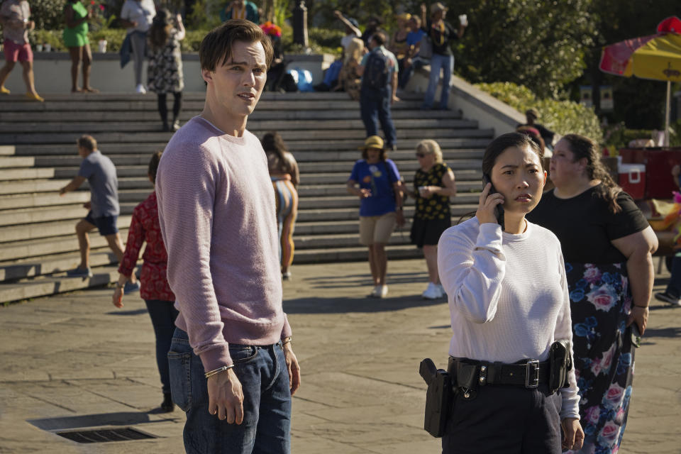 This image released by Universal Pictures shows Nicholas Hoult, left, and Awkwafina in a scene from "Renfield." (Michele K. Short/Universal Pictures via AP)