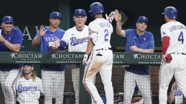 Texas Rangers second baseman Marcus Semien (2) swings at a pitch