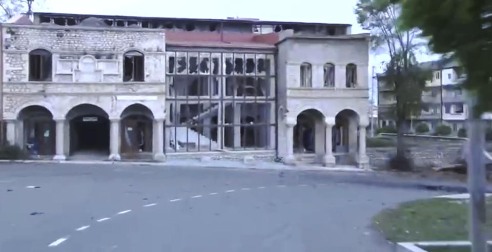 This photo taken from a video released by Azerbaijan's Defense Ministry on Monday, Nov. 9, 2020, shows a view of a street in Shushi, in the separatist region of Nagorno-Karabakh. President Ilham Aliyev said Sunday that Azerbaijani forces had taken control of the strategically important city in Nagorno-Karabakh, where fighting with Armenia has raged for over a month. (Azerbaijan's Defense Ministry via AP)