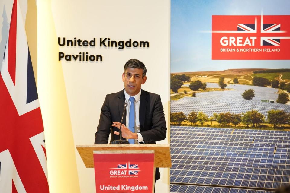 Rishi Sunak speaking to media at the climate change summit (PA)