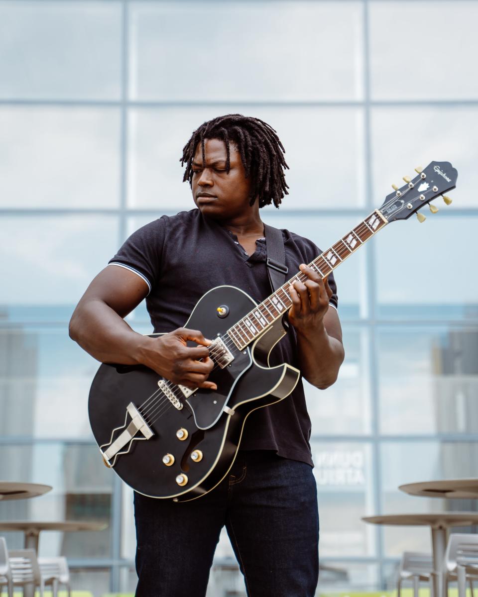 A portrait of James Tutson, who will perform the band James Tutson and the Rollback at Summer of the Arts' Friday Night Concert series.