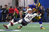 <p>Tom Brady #12 of the New England Patriots is sacked by Aaron Donald #99 of the Los Angeles Rams in the first quarter during Super Bowl LIII at Mercedes-Benz Stadium on February 3, 2019 in Atlanta, Georgia. (Photo by Harry How/Getty Images) </p>