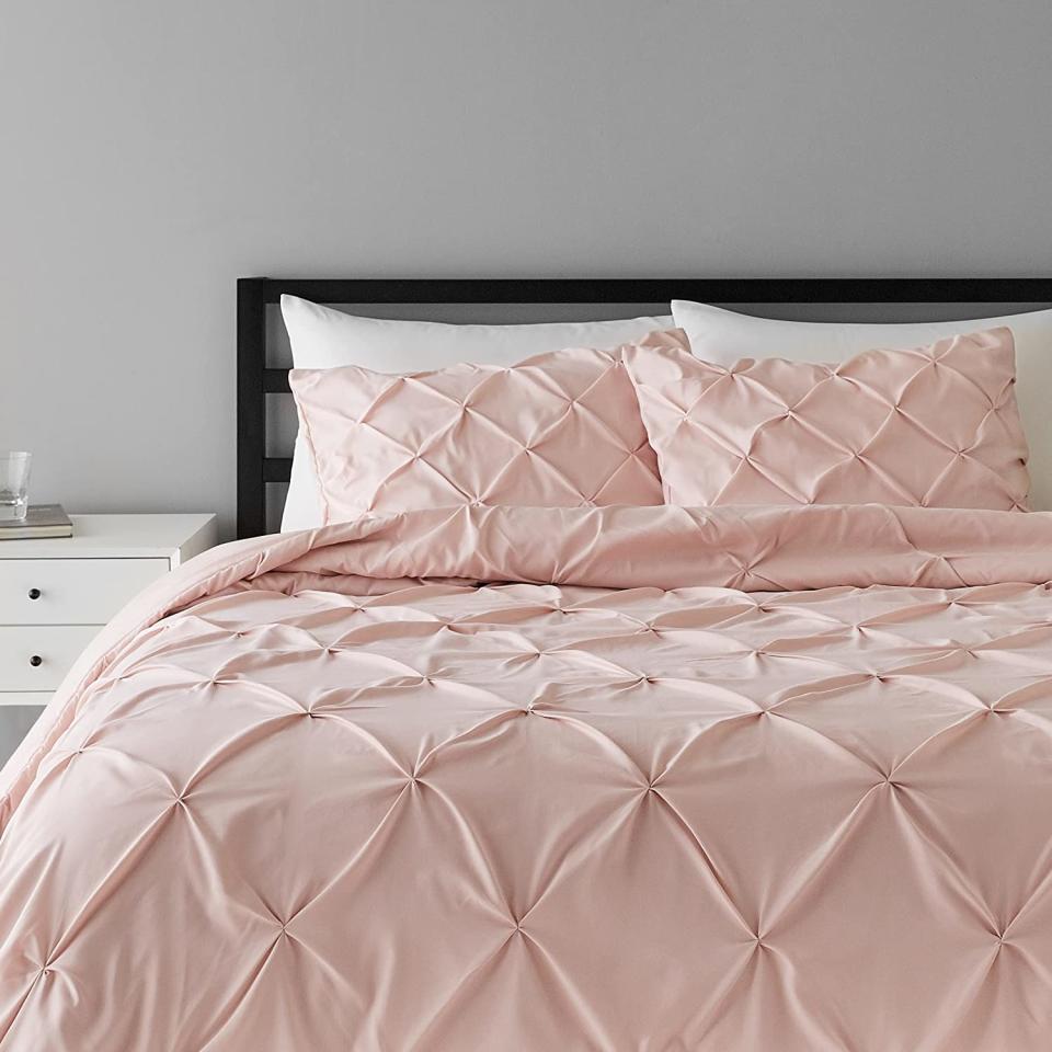 Amazon Basics Pinch Pleat Down-Alternative Comforter Bedding Set. Image via Amazon.