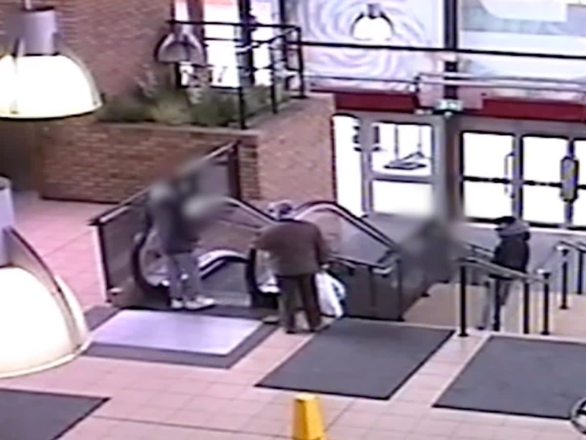 Mr Clarke confronts the group of boys playing on the escalator (Derbyshire Police)