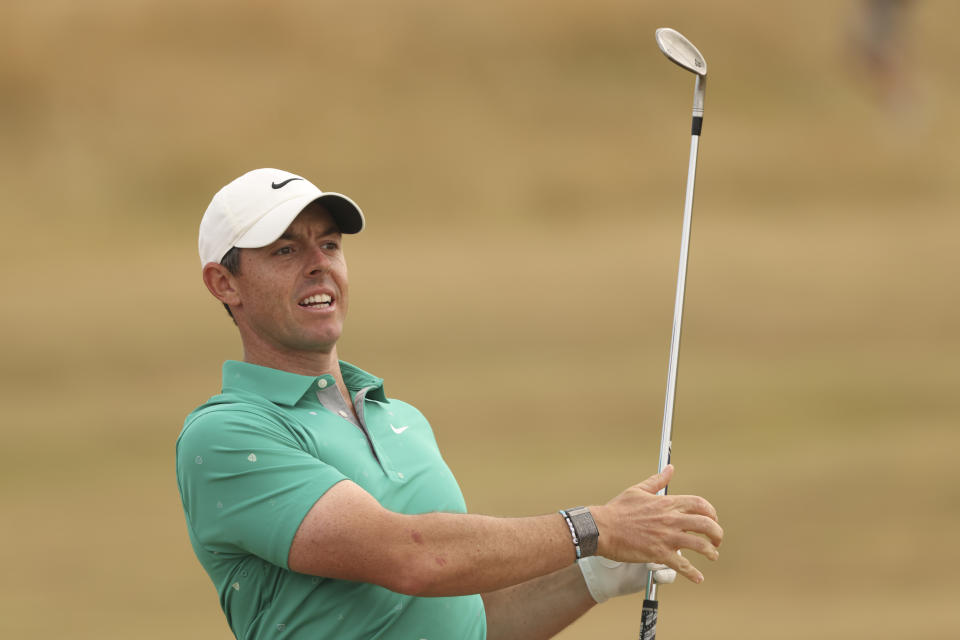 Rory McIlroy of Northern Ireland plays a shot on the 4th fairway during the third round of the British Open golf championship on the Old Course at St. Andrews, Scotland, Saturday July 16, 2022. (AP Photo/Peter Morrison)