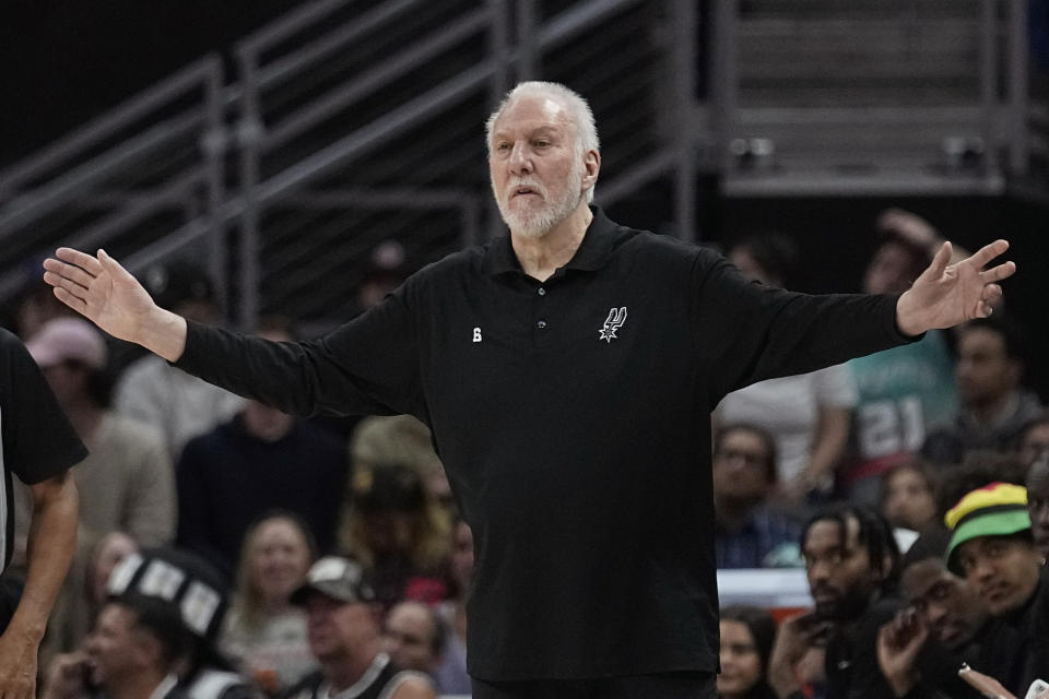 San Antonio Spurs head coach Gregg Popovich signals to his players during the first half of an NBA basketball game against the Portland Trail Blazers in Austin, Texas, Thursday, April 6, 2023. (AP Photo/Eric Gay)