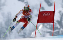 Canada's Jan Hudec takes a jump during the men's alpine skiing Super-G competition at the 2014 Sochi Winter Olympics at the Rosa Khutor Alpine Center February 16, 2014. REUTERS/Stefano Rellandini (RUSSIA - Tags: SPORT SKIING OLYMPICS)