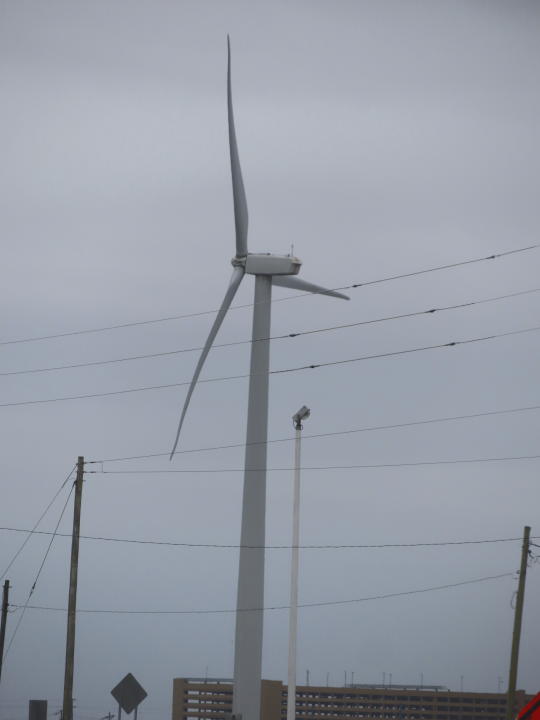 A land-based wind turbine spins in Atlantic City, N.J. on Wednesday, Sept. 18, 2024. (AP Photo/Wayne Parry)