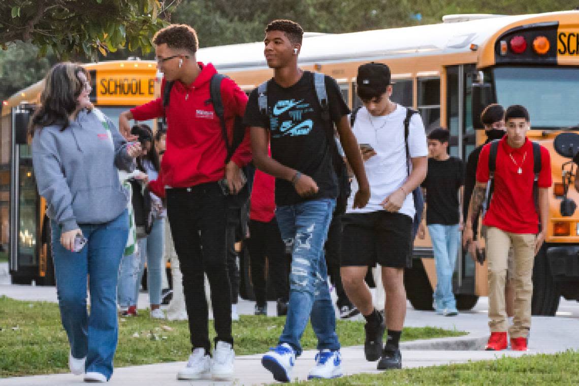 Students enter campus from the bus loop on the first day of school at Miami Beach High in Miami Beach, Florida on Aug. 17, 2022.