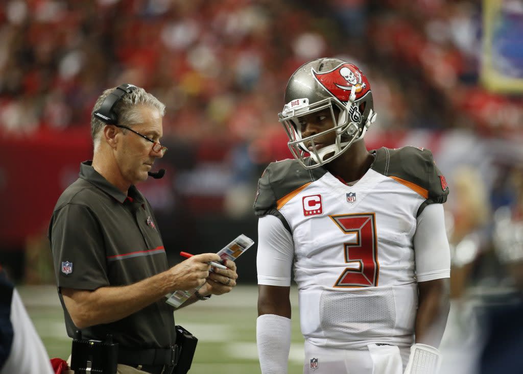 Sep 11, 2016; Atlanta, GA, USA; Tampa Bay Buccaneers head coach Dirk Koetter talks with quarterback Jameis Winston (3) in the fourth quarter of their game against the Atlanta Falcons at the Georgia Dome. The Buccaneers won 31-24. Mandatory Credit: Jason Getz-USA TODAY Sports