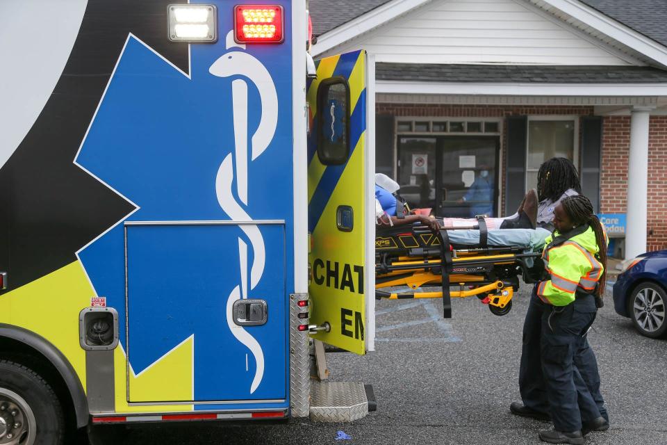 EMTs from Chatham EMS, load a patient who was having difficulty breathing into their ambulance for transport to a local hospital on Friday March 10, 2023.