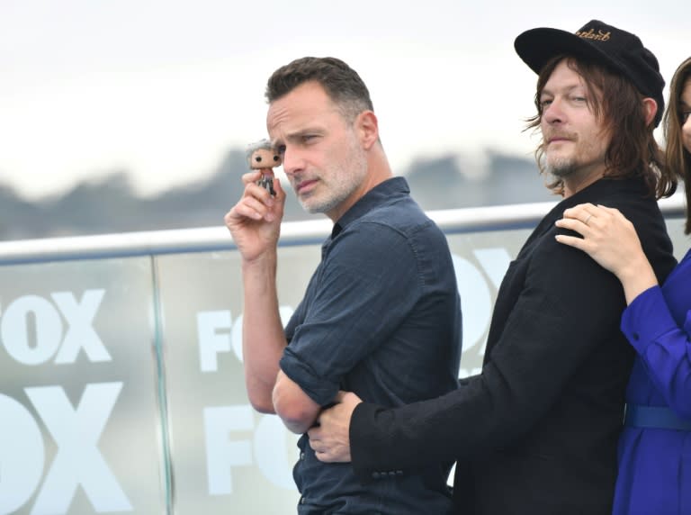 Actors Andrew Lincoln and Norman Reedus, at the Comic-Con International photo call for "The Walking Dead," whose post-apocalyptic zombie-ridden vision of the United States has proved uniquely resonant