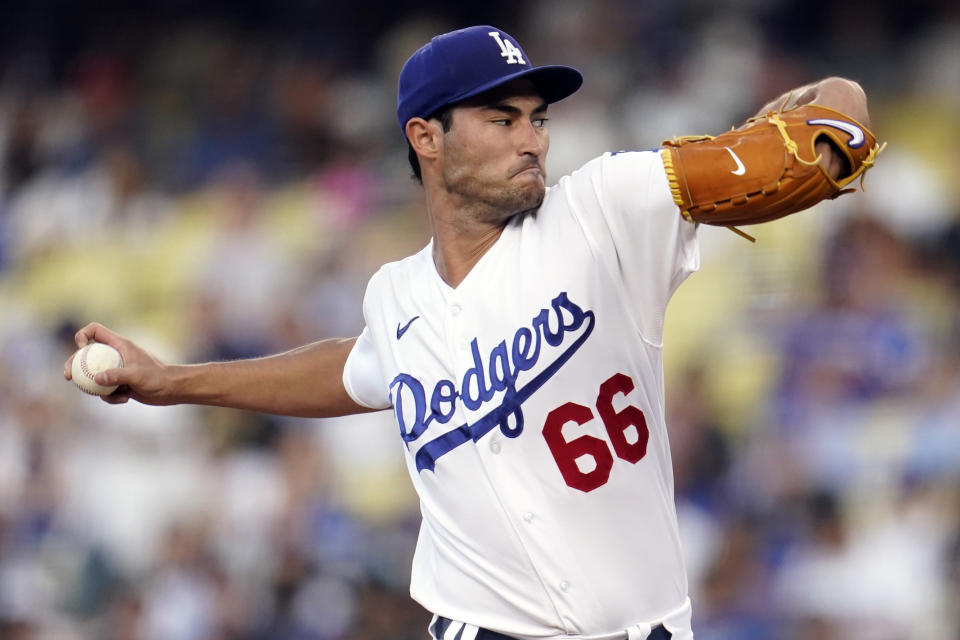 Los Angeles Dodgers starting pitcher Mitch White throws to a San Francisco Giants batter during the second inning of a baseball game Thursday, July 21, 2022, in Los Angeles. (AP Photo/Marcio Jose Sanchez)