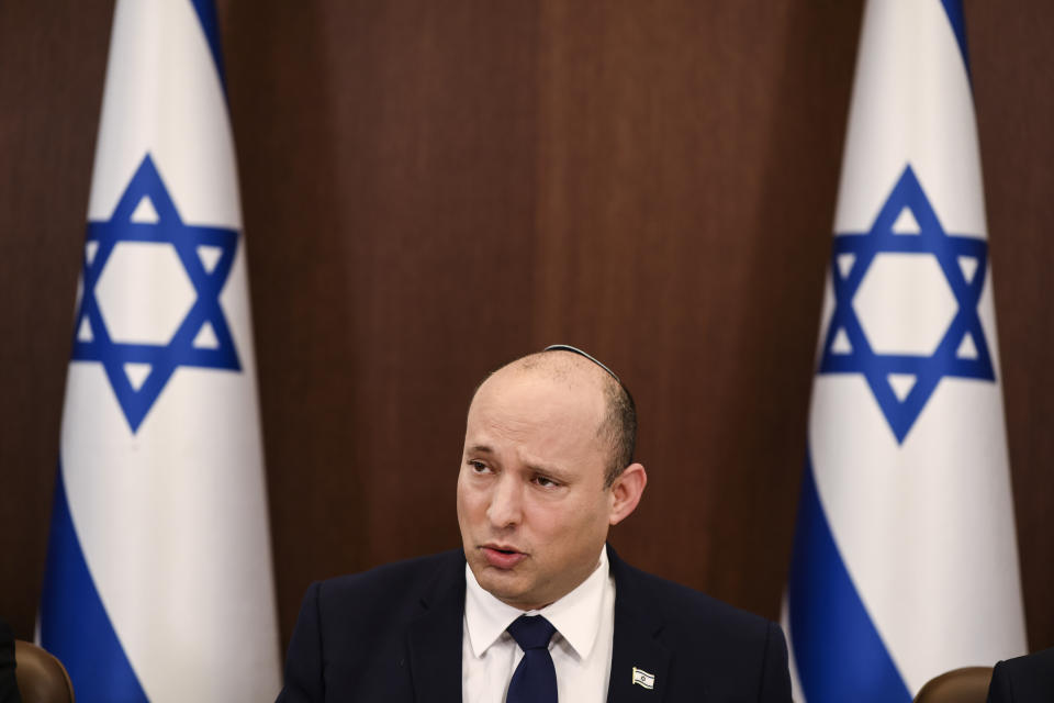 FILE - In this Oct. 5, 2021 file photo, Israeli Prime Minister Naftali Bennett speaks at the weekly cabinet meeting in Jerusalem. Iran and world powers resume talks in Vienna this week of Nov. 28, aimed at restoring the nuclear deal that crumbled after the U.S. pulled out three years ago. There are major doubts over whether the deal can be reinstated after years of mounting distrust. (Ronen Zvulun/Pool via AP, File)