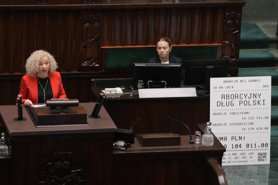 Katarzyna Kotula, the Minister for Equality, speaks as the Polish parliament debates liberalizing the abortion law, in Warsaw, Poland, on Thursday April 11, 2024. The traditionally Catholic nation has one of the most restrictive laws in Europe — but the reality is that many women terminate pregnancies at home with pills mailed from abroad. Kotula, from the Left party, recalled that abortion was legal in Poland during the communist era and "German, French and British women then fought for the right to self-determination and came to us, to Poland, to terminate such unwanted pregnancies". (AP Photo/Czarek Sokolowski)