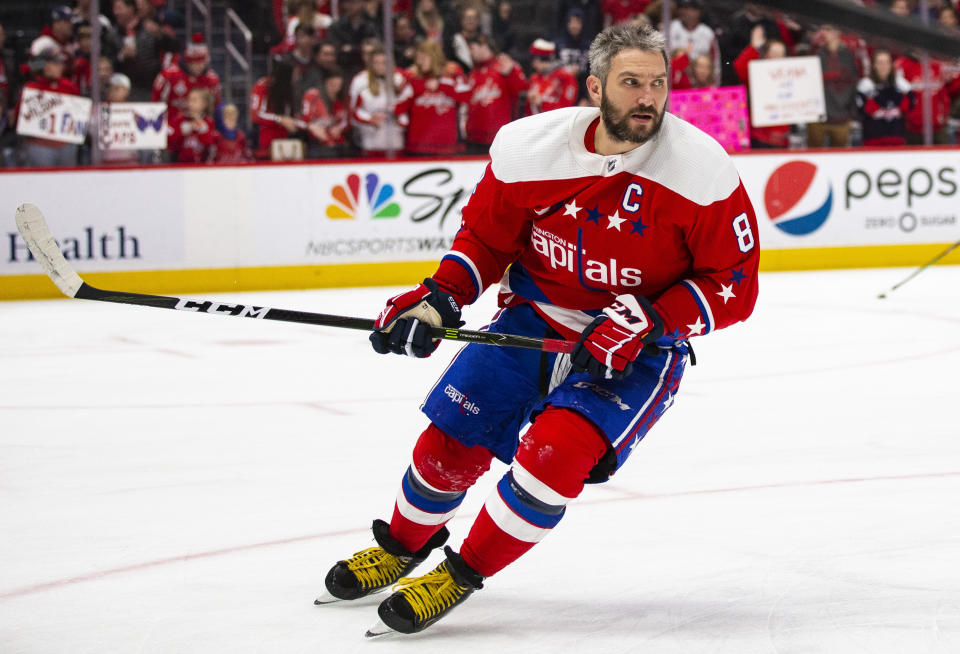 Washington Capitals left wing Alex Ovechkin (8), from Russia, skates during warmups before an NHL hockey game against the New Jersey Devils, Thursday, Jan. 16, 2020, in Washington. (AP Photo/Al Drago)