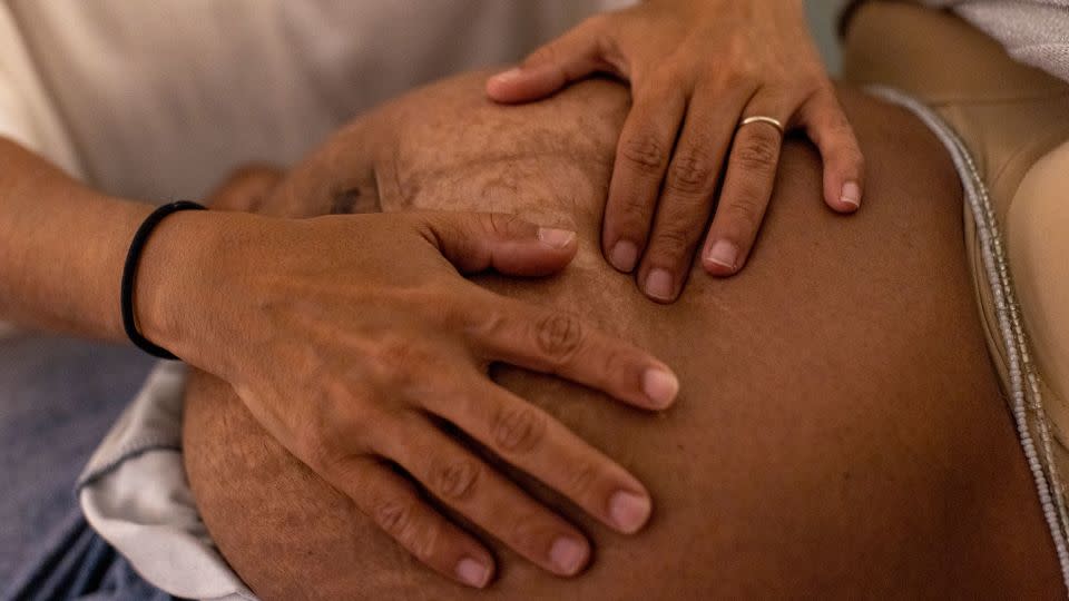 Hinman examines Kountz during her November appointment. Kountz is due to have her sixth baby in January. - Alyssa Pointer for CNN