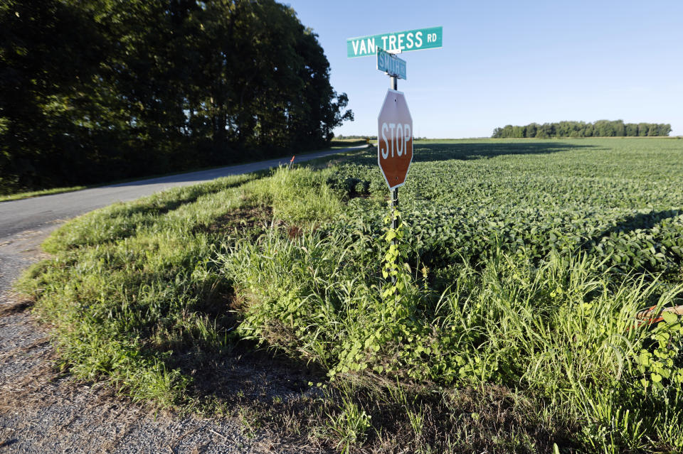 The intersection of Smith Road and Van Tress Road in Chester Township, Ohio, seen Friday, Aug. 12, 2022, near where the Ohio State Highway Patrol says a standoff took place the day before. Authorities are investigating the motives 42-year-old Ricky Shiffer, an armed man who they say tried to breach the FBI’s Cincinnati office, fled and died hours later in a rural standoff with law enforcement. (AP Photo/Paul Vernon)