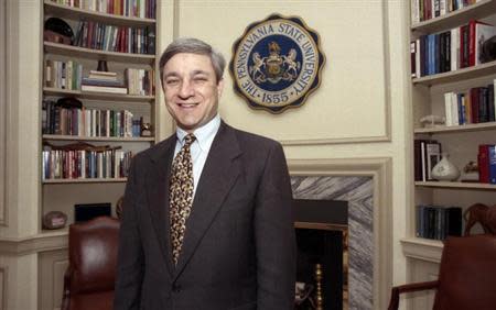 Penn State University President Graham Spanier poses in his office in the Old Main building in State College, Pennsylvania, in this February 26, 1997 file photo. REUTERS/Craig Houtz/Files